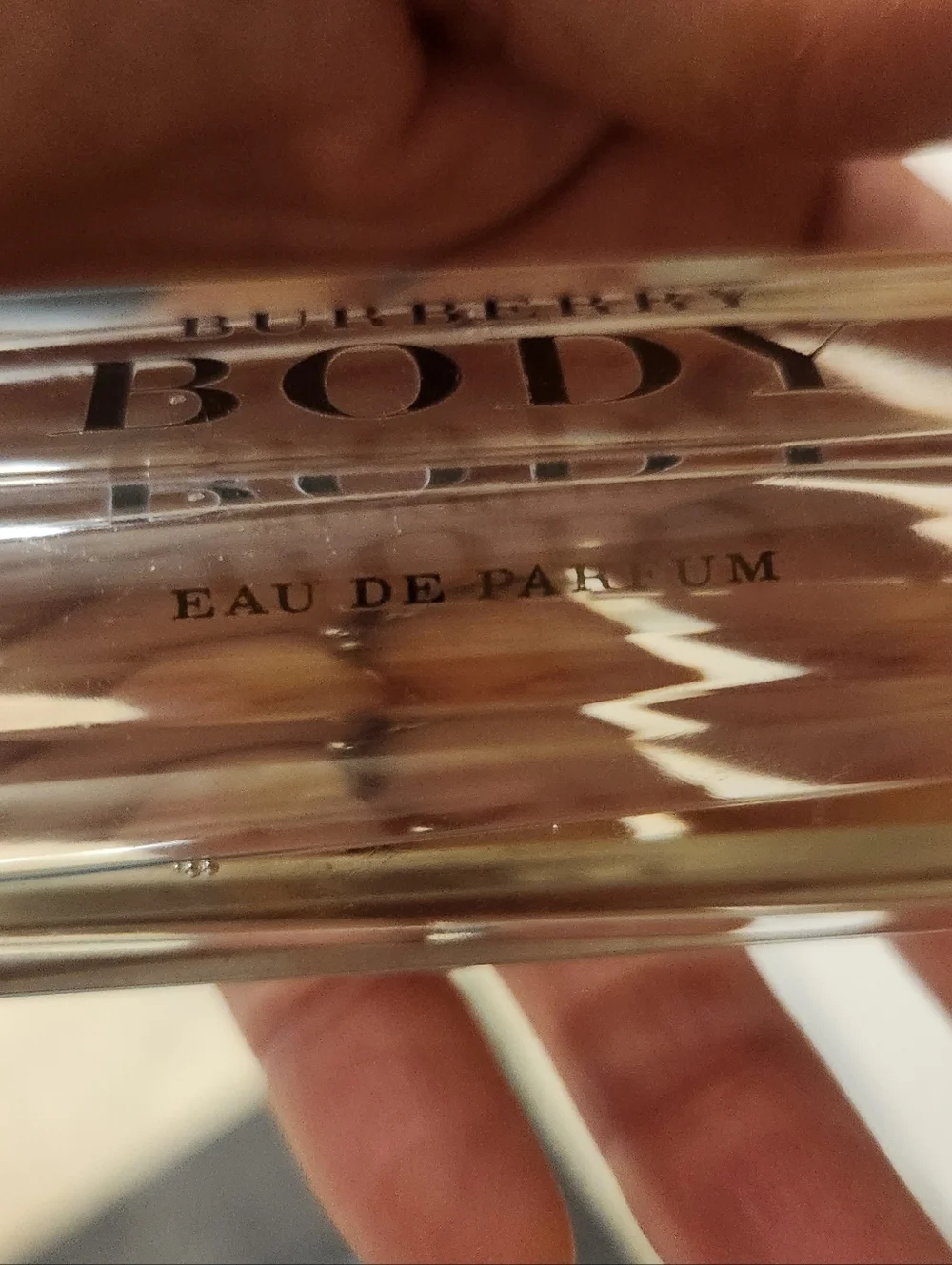 Burberry Body Eau de Parfum — Clear Bottle with Gold Cap. - Picture 2 of 3